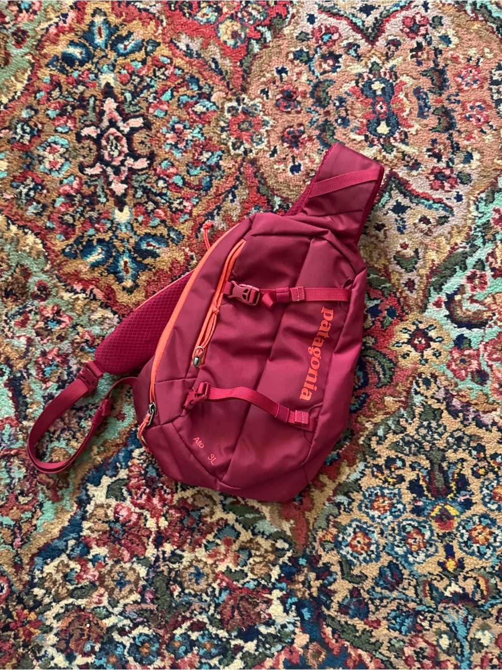 Patagonia Burgundy Sling Belt Bag with Orange Zipper